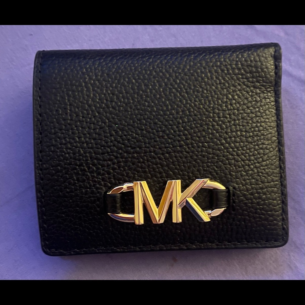 Michael Kors beautiful black wallet with gold emblem